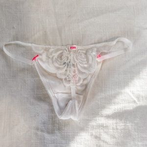 NWT PINK Victoria’s Secret thong. Size: S. Color: white